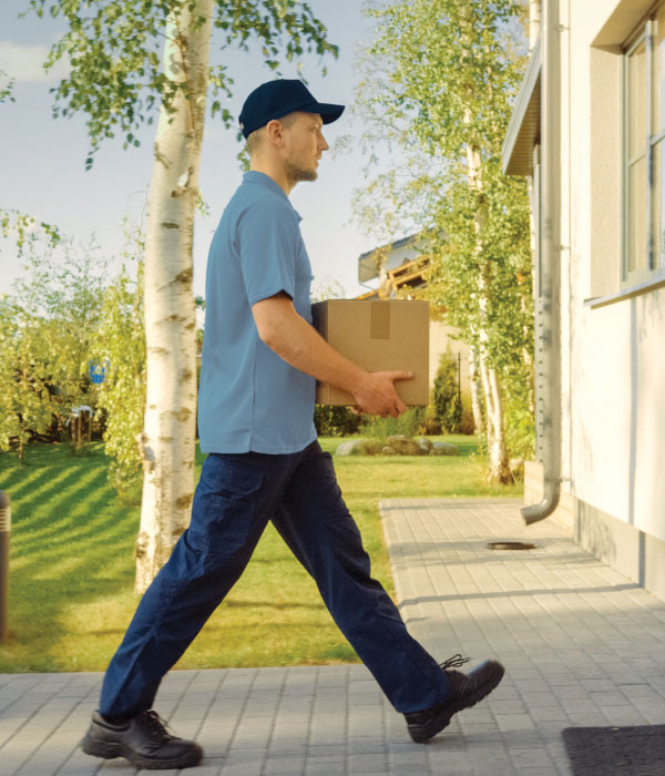 Delivery Person Walking With Package